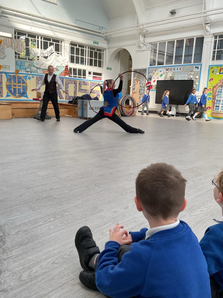 Andrew Van Buren and Allyson circus skills in schools