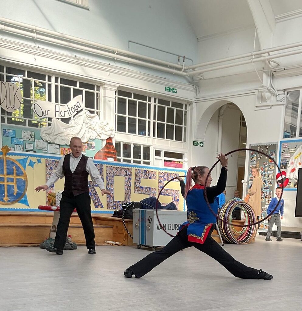 Andrew Van Buren and Allyson circus skills in schools