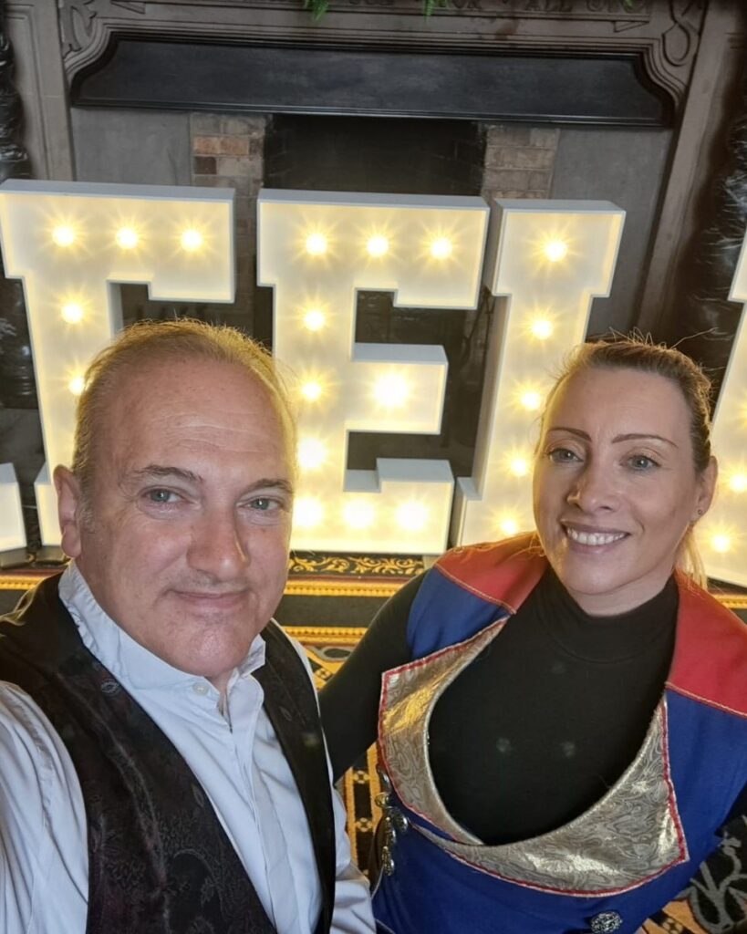Andrew Van Buren and Allyson performing circus skills and magic at Keele University.