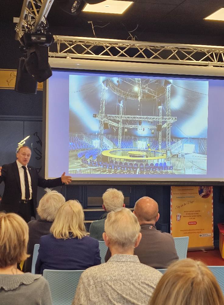 Andrew Van Buren lecture, talking about circus buildings.